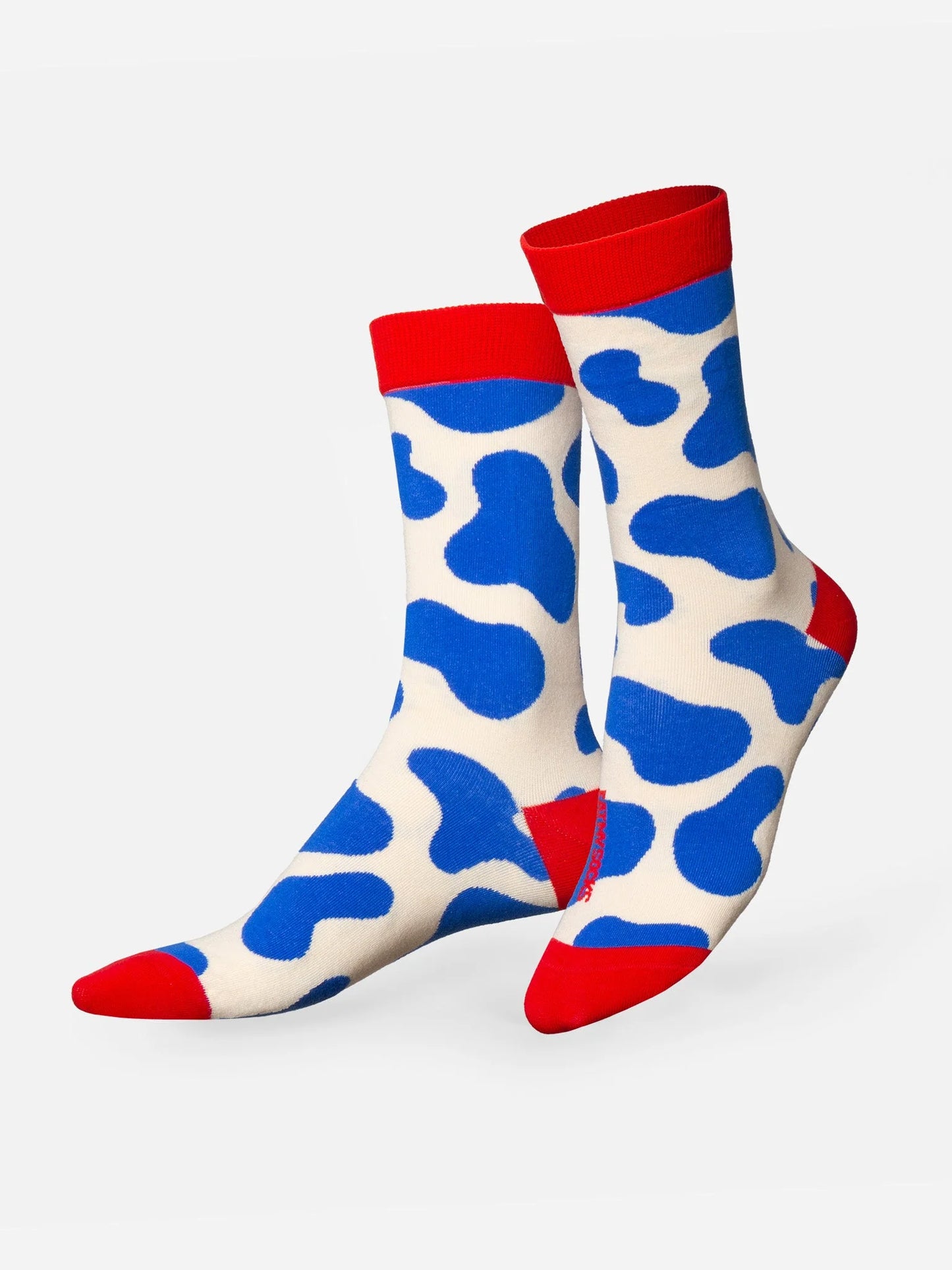 Blau-weiße Milk-Socken von Eat My Socks mit Kuhflecken